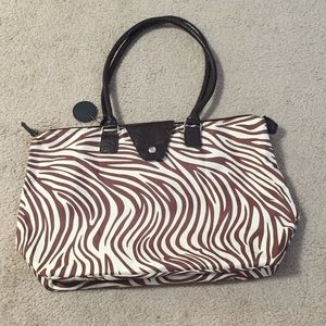 Women's tan and brown zebra tote bag
